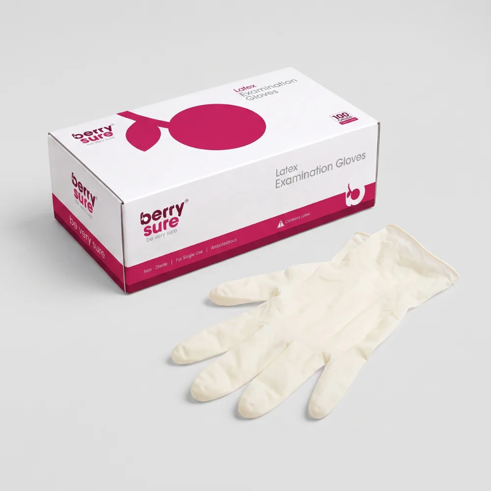 Latex examination gloves box beside a pair of latex gloves